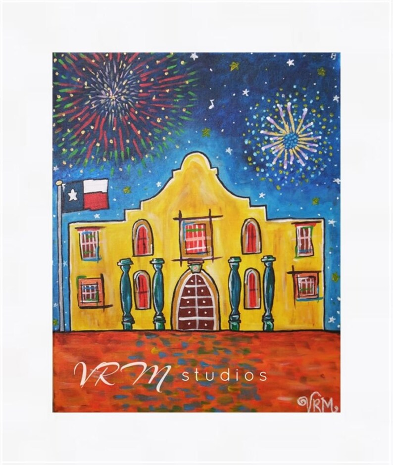 May include: A vibrant painting of the Alamo with fireworks in the night sky. The yellow building has red accents and a Texas flag. The artwork is signed "VRM studios".