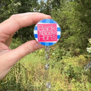 Back and Body Hurts Badge Reel