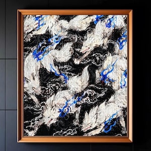 May include: A framed artwork featuring a dynamic composition of white wolves against a black background. The wolves have detailed fur and are accented with blue streaks, creating a sense of movement. The artwork is enclosed in a wooden frame.