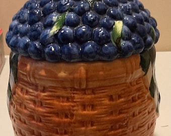 A ceramic blueberry basket cookie jar