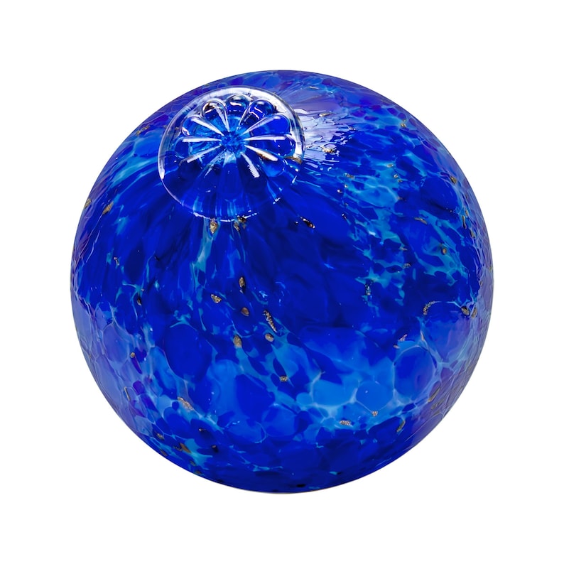 May include: A blue glass sphere with a swirling pattern and gold flecks. The sphere has a small opening at the top.