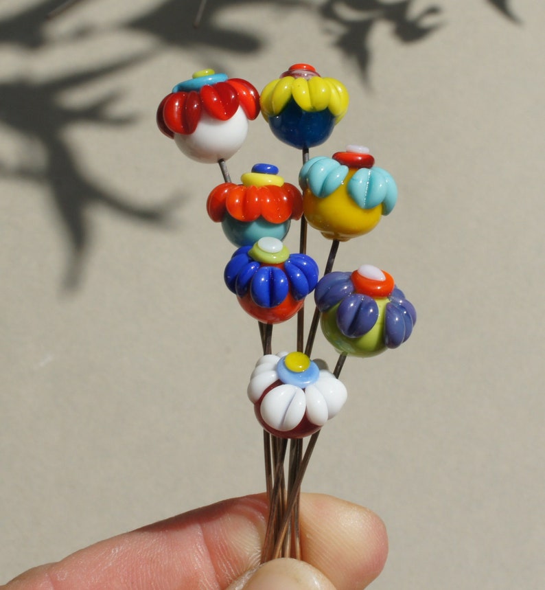 Handmade lampwork glass flower headpins in vibrant colors by Etsy