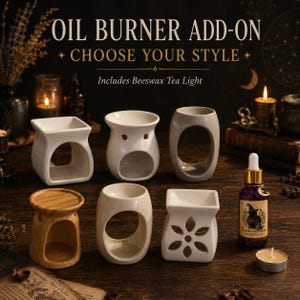 May include: Six ceramic and wooden oil burners in various shapes and sizes, including square, round, and floral cut-out designs. A purple glass dropper bottle with a label reading Sticks and Stones Naturals and a beeswax tea light are included.