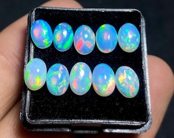 Natural Ethiopian Opal Cabochon Welo Fire Opal Ovals Top Colorful Opal Loose Gemstone For Jewelry. 10 Pcs Box