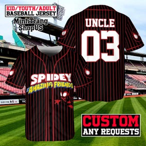 A baseball jersey with the name "Uncle" and the number "03" printed on it, along with the text "SPIDEY" and "AMAZING FRIENDS" printed on it. The jersey is displayed against a backdrop of a baseball field and stadium seating.