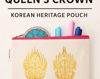 May include: Cream-colored Korean heritage pouch with a gold crown design. The pouch has a red zipper and contains blue, pink, and blue pens. Text on the pouch reads "INSPIRED BY BAEKJE QUEEN'S CROWN" and "KOREAN HERITAGE POUCH".