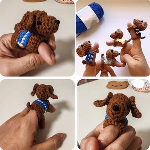 May include: Crocheted brown finger puppets shaped like dachshund dogs. Each puppet has a small blue and white sweater. The puppets are displayed on fingers, showcasing their size and detail. A ball of blue yarn is in the background.
