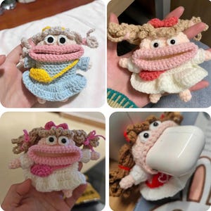 May include: Crocheted character-shaped AirPod cases in various poses. The cases feature a cartoonish design with large pink lips, curly hair, and bows. One case is blue with a yellow purse, while others are white and pink.
