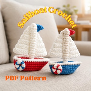 May include: Two handmade crochet sailboats. One has a red base and the other has a blue base. Both have white sails and a small decorative wheel on the side. The text "Sailboat Crochet" and "PDF Pattern" are in the image.