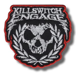 May include: Embroidered patch with the text "KILLSWITCH ENGAGE" above a skull design. The patch is black with white and red detailing. The skull is encircled by a laurel wreath. The patch has a red border.