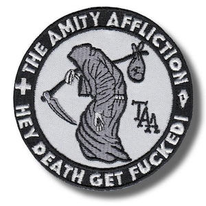 May include: Round patch with a black border and a white centre. The design features a Grim Reaper with a scythe and a sack. The text around the edge reads "HEY DEATH GET FUCKED!" and "THE AMITY AFFLICTION".