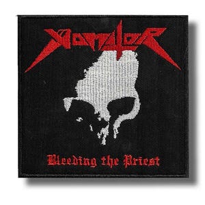 May include: Black square patch with the red word "Xantor" above a white skull graphic. Below the skull, the text "Bleeding the Priest" is in red. The patch has a black border, suitable for sewing onto clothing or bags.