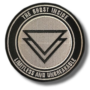 May include: Circular patch with black border and text "THE GHOST INSIDE" and "LIMITLESS AND UNBREAKABLE". The center features a light gray circle with a black inverted triangle design.