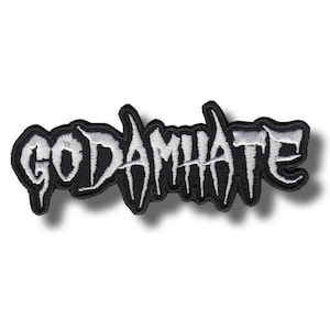 May include: A black and white embroidered patch with the text "GODAMHATE" in a stylized font. The patch has a black border and the text is in white. The patch is rectangular and appears to be new.