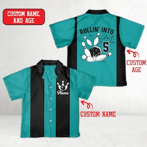 May include: Teal and black bowling shirt with a button-down front. The front features a bowling pin graphic and the word "Name". The back has a bowling ball and pins graphic with the text "ROLLIN' INTO 5". The shirt is designed for custom name and age.