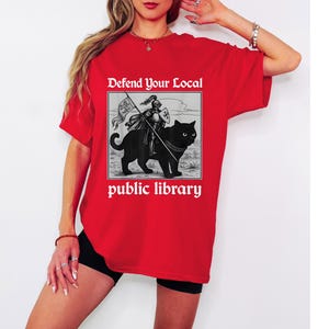 Defend Your Local Public Library Shirt - Funny Knight Cat T-Shirt for Men Women - Book Lover Reading Graphic Tee Gift