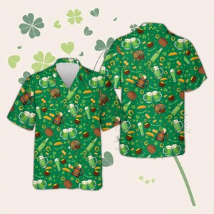 May include: Green button-up shirt with a repeating pattern of beer mugs, horseshoes, pots of gold, and shamrocks. The shirt has a white collar and is displayed with a matching shirt. The design is festive and suitable for St. Patrick's Day.