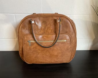 vintage brown bowling ball bag.
