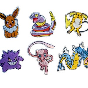 May include: Embroidered patches featuring various Pokémon characters. Includes Eevee, a purple snake, a yellow Raichu, a purple Gengar, a pink Mew, and a blue and yellow Gyarados. Each patch has detailed stitching and vibrant colors.