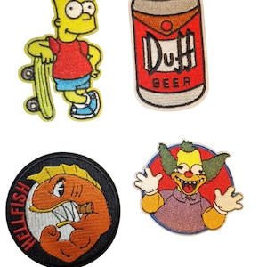 May include: Four embroidered patches featuring cartoon characters. One patch depicts Bart Simpson with a skateboard. Another shows a Duff Beer can. A third patch features a Hellfish character, and the last one is Krusty the Clown.