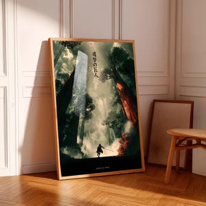 May include: A framed art print featuring a forest scene with a silhouetted figure holding a sword. The artwork has a dark, atmospheric quality with Japanese text and the words "attack on titan" at the bottom.