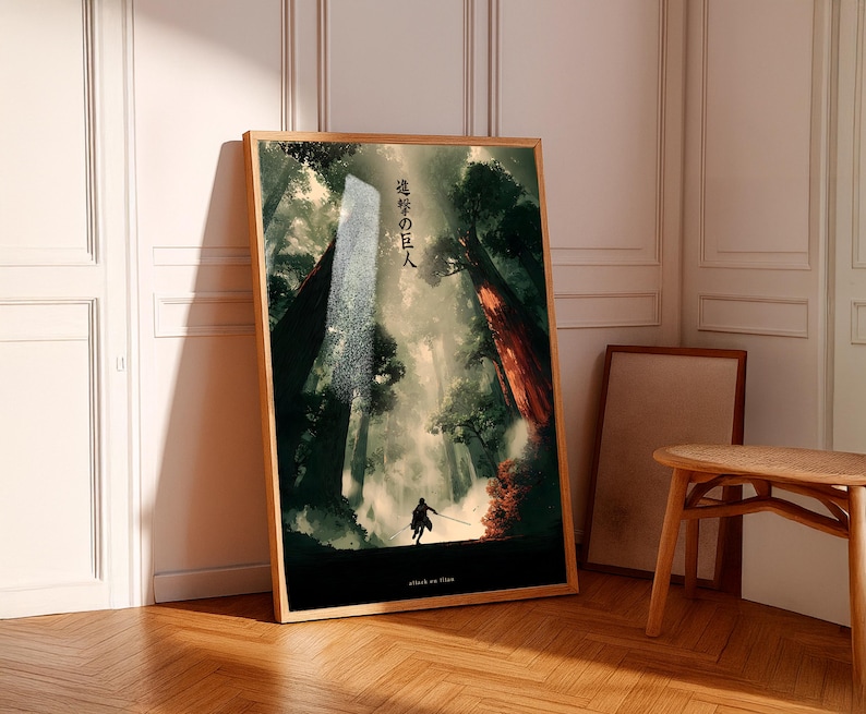 May include: A framed art print featuring a forest scene with a silhouetted figure holding a sword. The artwork has a dark, atmospheric quality with Japanese text and the words "attack on titan" at the bottom.