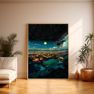 May include: A framed art print depicts a night scene with a witch flying on a broom over a city. The artwork features a starry sky, a full moon, and the city lights below. The print is displayed in a room with a sofa and plants.