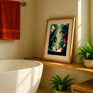 May include: A bathroom scene featuring a framed artwork with Japanese text, a white bathtub, and a rust-colored towel. The artwork depicts a forest scene with a figure. Green plants in white pots add a touch of nature to the room.