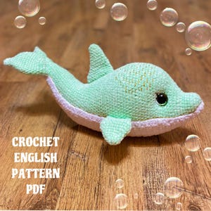 Schema per realizzare un delfino all'uncinetto in stile amigurumi: giocattolo a forma di animale marino (schema in PDF)