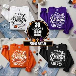 Könnte beinhalten: Vier Gildan 18000 Rundhals-Sweatshirts in Weiß, Lila, Orange und Schwarz. Jedes zeigt eine weiße oder schwarze Grafik mit dem Text "YOUR DESIGN HERE", einem Hexenhut und einem Kürbis. Ein zentrales kreisförmiges Abzeichen zeigt "30 COLORS GILDAN 18000".