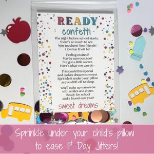 May include: A clear plastic bag filled with confetti and a card that reads "READY confetti". The card has a poem about the night before school. Colorful confetti, including stars, apples, and school buses, surrounds the bag. Text at the bottom says "Sprinkle under your child's pillow to ease 1st Day Jitters!"