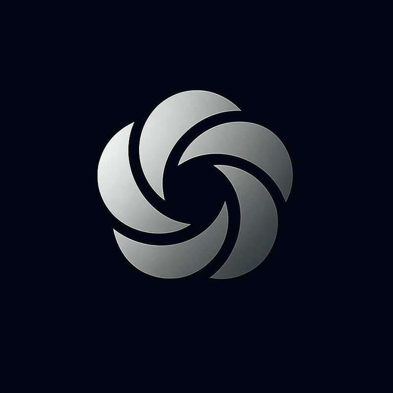 May include: A silver, stylized, circular design on a dark background. The design is composed of five curved, crescent-shaped elements arranged in a circular pattern, creating a central opening. The elements have a gradient effect, transitioning from light to dark.