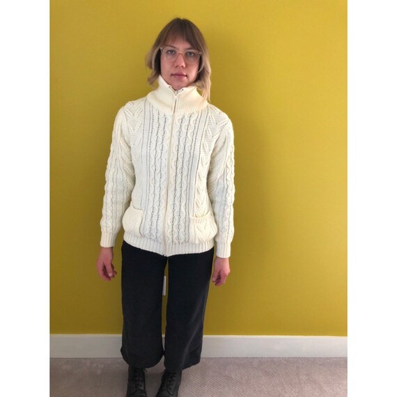 cream colored cardigan sweater