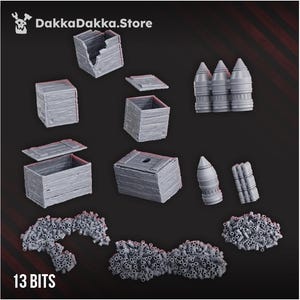 May include: A collection of gray miniature wooden crates, ammunition, and terrain bits. The image includes various sizes and styles of crates, along with several artillery shells and small, textured terrain pieces. The text "13 BITS" is visible at the bottom.