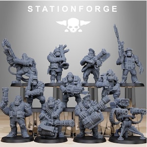 May include: A collection of gray miniature figurines of Orc warriors, each armed with various weapons, including rifles, chainsaws, and heavy machine guns. The figures are displayed on black stands, with the "STATIONFORGE" logo at the top.