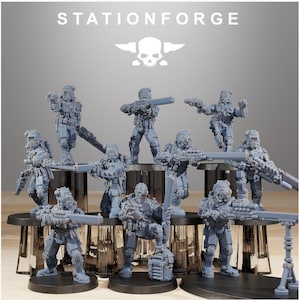 May include: A group of grey miniature soldier figures, each holding rifles and other weapons. The figures are displayed on a tiered platform, with the word "STATIONFORGE" and a skull logo above them.