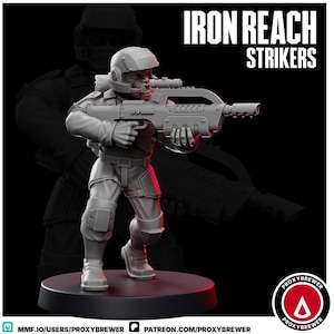 May include: A gray figurine of a soldier in a helmet and tactical gear, holding a futuristic rifle. The figure is posed on a black base, with the words "IRON REACH STRIKERS" in white text above. The background features a shadowy outline of a similar figure.