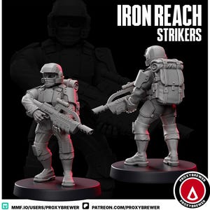 May include: Two gray miniature figurines of soldiers in combat gear, holding futuristic rifles. The figures stand on black circular bases. The text "IRON REACH STRIKERS" is displayed in white at the top of the image. A logo is in the bottom right corner.
