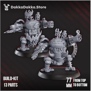 Peut inclure: Deux figurines de robots gris avec des conceptions mécaniques détaillées, sur des socles noirs. Le texte sur l'image indique "BUILD-KIT 13 PARTS" et "77 MM FROM TOP TO BOTTOM". Le logo du magasin "DakkaDakka.Store" est visible.