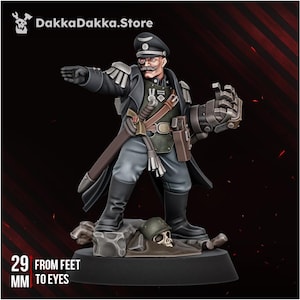May include: A miniature figurine of a military officer in a black coat, grey trousers, and cap, featuring a mechanical left hand, a monocle, and a moustache. The figure stands on a base with a skull and helmet, marked 29 mm from feet to eyes.