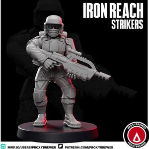 May include: A gray figurine of a soldier in tactical gear, holding a futuristic rifle. The figure is on a black base, with the words "IRON REACH STRIKERS" in white text. The background features a shadowy outline of a similar figure.