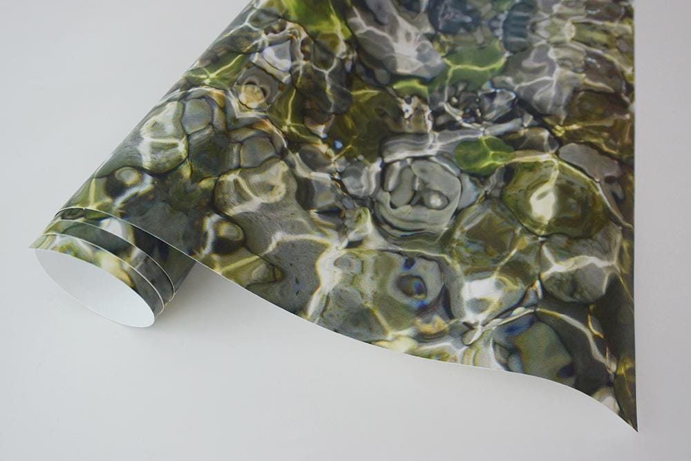 Paste on the wall wallpaper, bold green pebble design, designer made, satin finish.