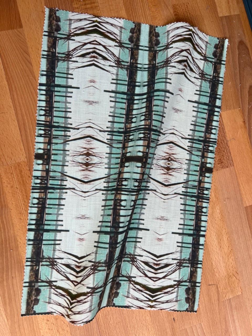Abstract water linen fabric, green hued water textile. Bold desiger fabric, contemporary luxury material for home decor. Curtaining.