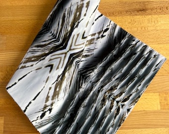 Current, designer velvet by the metre, upholstery, home furnishings, black and white abstract water theme.
