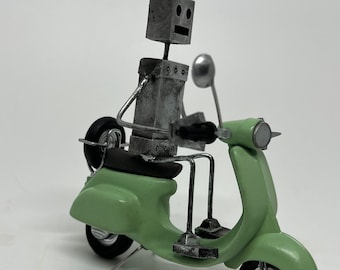 Robot on a Vespa