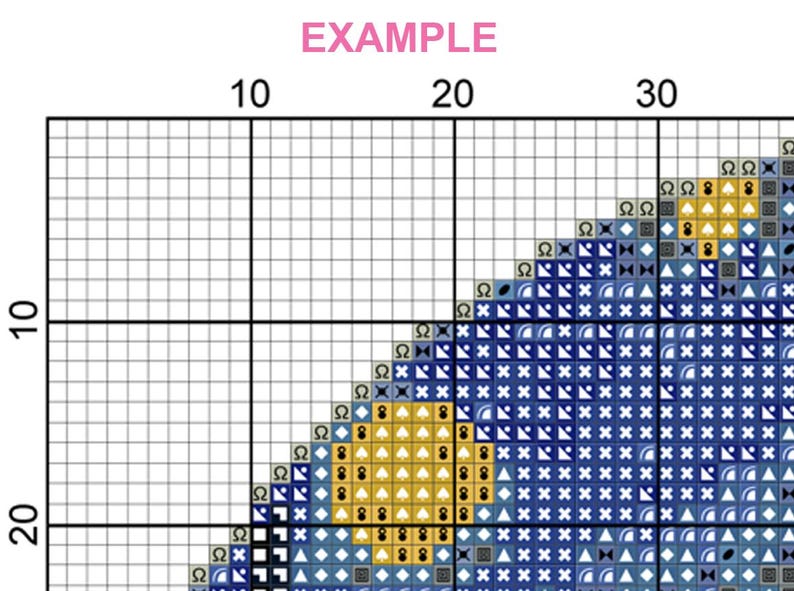 May include: A cross-stitch pattern with a grid of squares, featuring a design in shades of blue, yellow, and white. The word "EXAMPLE" is written in pink at the top. The pattern is partially completed, showing the beginning of a design.