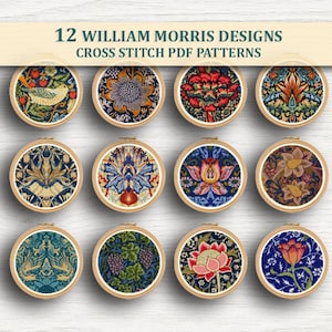 May include: Twelve William Morris designs cross stitch PDF patterns are displayed in wooden embroidery hoops. Each hoop features a different colorful floral or bird design. The text "12 WILLIAM MORRIS DESIGNS CROSS STITCH PDF PATTERNS" is at the top.