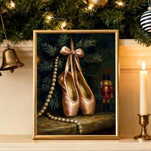 Nutcracker ballet Christmas wall art printable in a light oak frame on a mantel with evergreen garland and warm fairy lights.