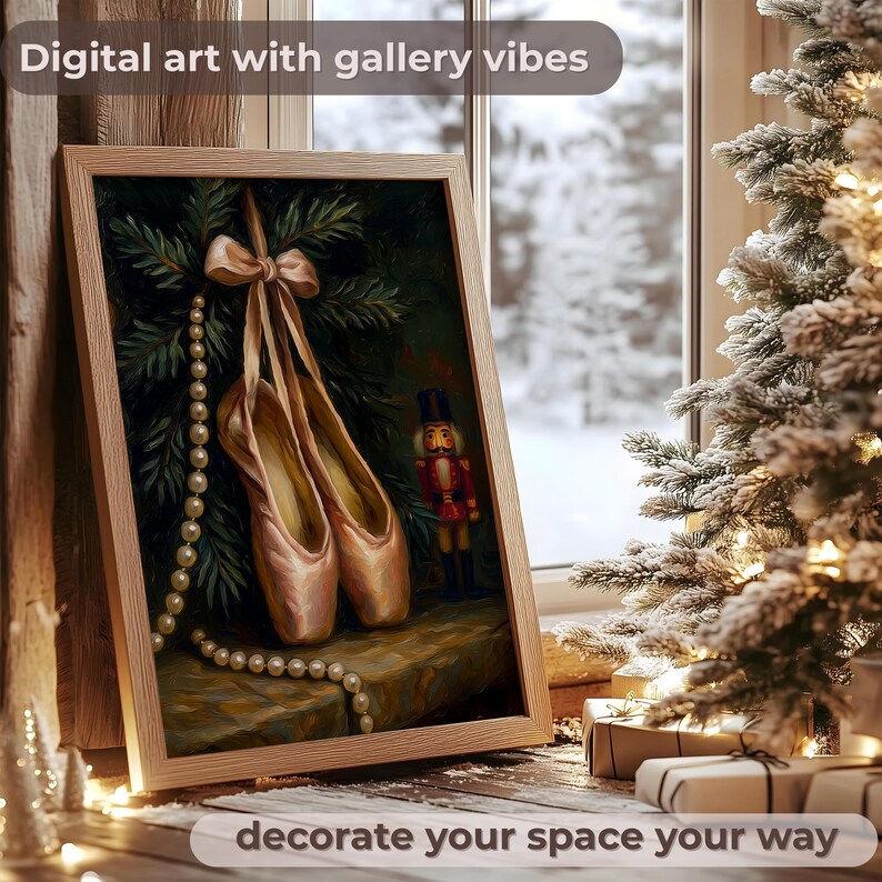 May include: A framed digital art print featuring ballet pointe shoes hanging from a bow, with a string of pearls. The artwork is set against a backdrop of evergreen branches and a small nutcracker figurine. The text "Digital art with gallery vibes" and "decorate your space your way" are visible.