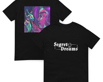 May include: Two black t-shirts. One features a colorful graphic of a woman and a cat, the other has the text "Secret Dreams" in white. The graphic on the first shirt has neon green, purple, and pink colors.